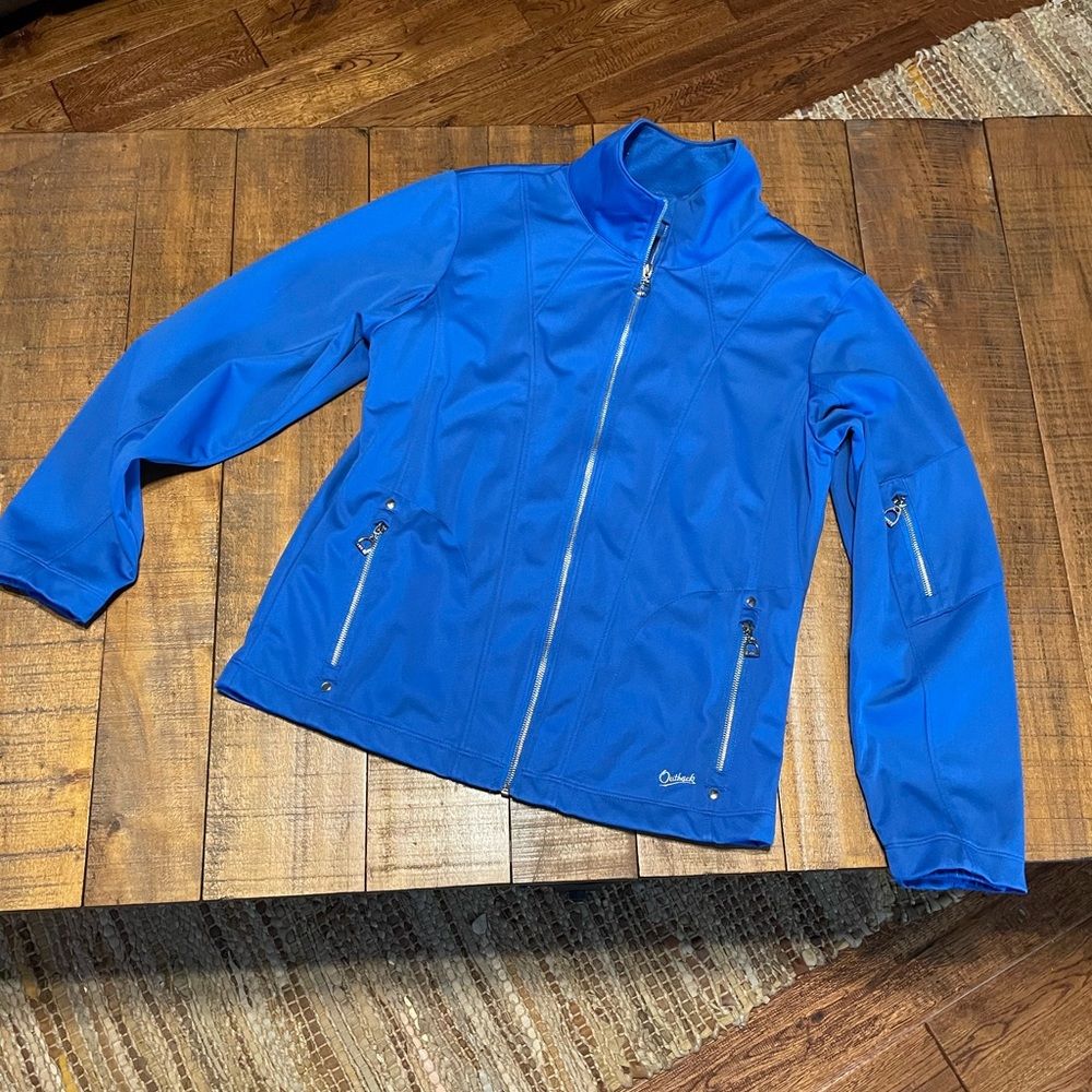 Outback coat Details with horse stirrups zipper pulls